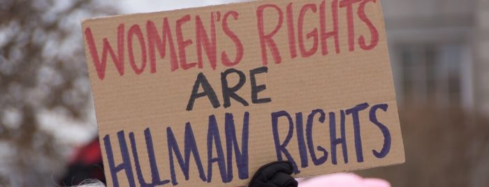 sign in a demonstration on which is written Womens' rights are human rights